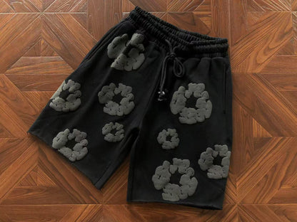 Pantaloncini con strappi in denim 