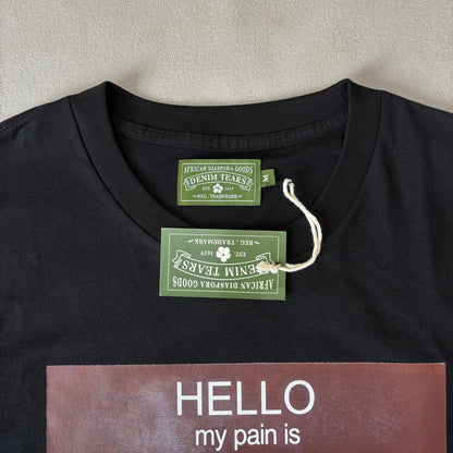 Maglietta con lacrime di denim 