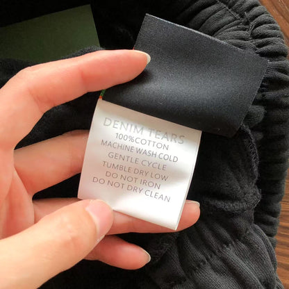 Pantaloncini con strappi in denim 