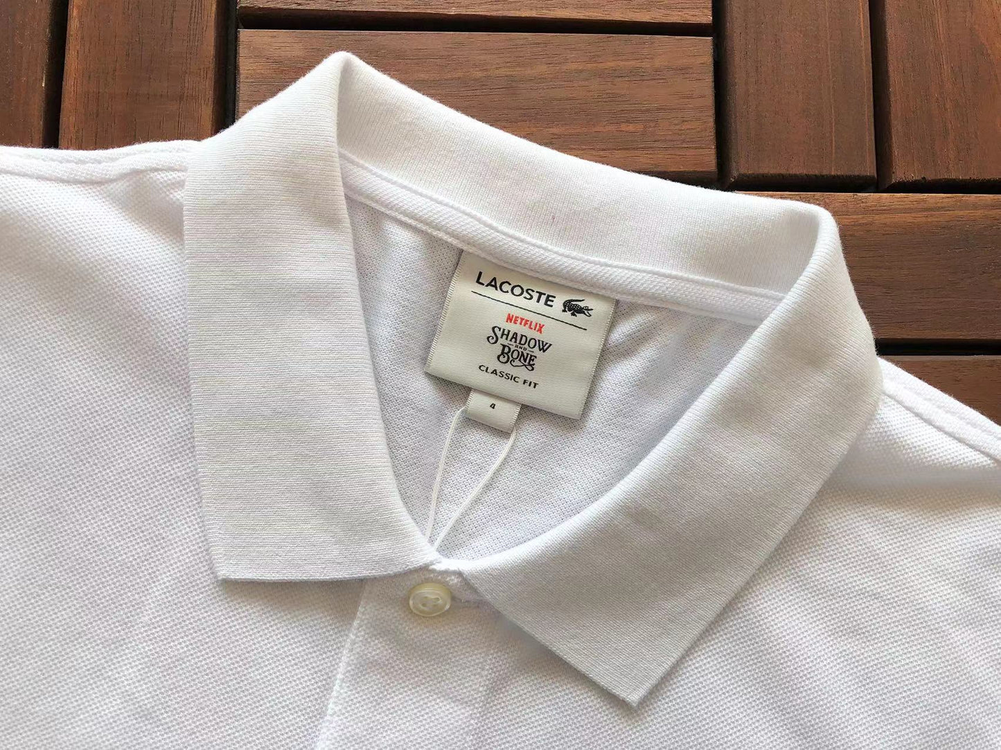 Collezione Polo Lacoste x Netflix