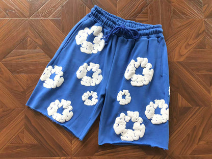 Pantaloncini con strappi in denim 