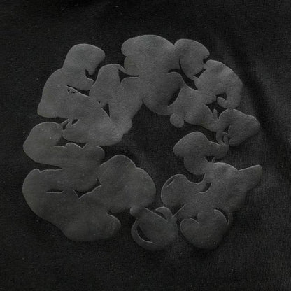 Maglietta con lacrime di denim 