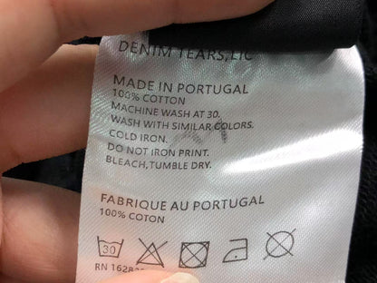 Maglietta con lacrime di denim