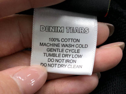 Pantaloncini con strappi in denim