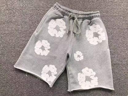 Pantaloncini con strappi in denim