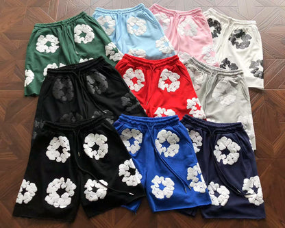 Pantaloncini con strappi in denim 