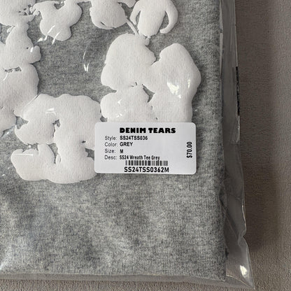 Maglietta con lacrime di denim 