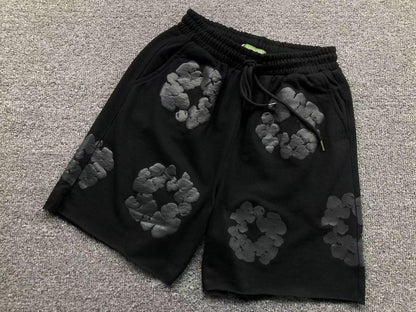 Completo corto con strappi in denim