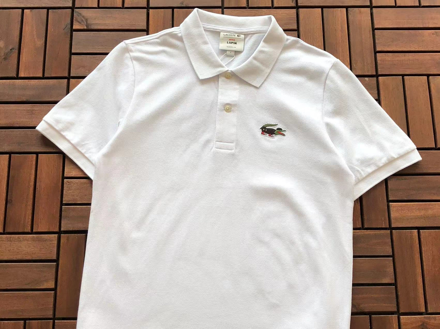 Collezione Polo Lacoste x Netflix