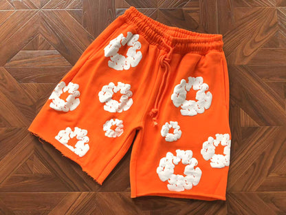 Pantaloncini con strappi in denim 