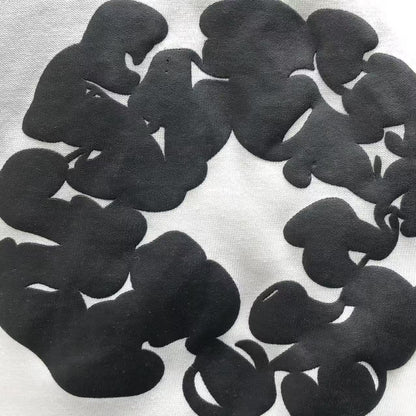 Maglietta con lacrime di denim 