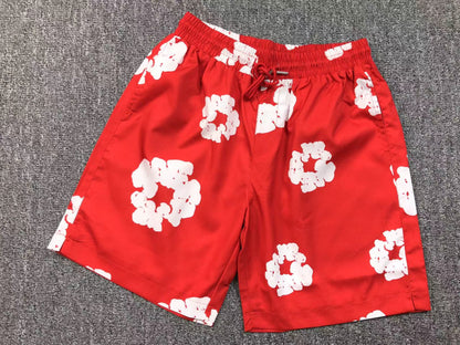 Tuta da bagno con strappi in denim