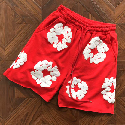 Pantaloncini con strappi in denim 