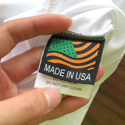 Maglietta con lacrime di denim 