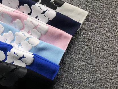 Completo corto con strappi in denim