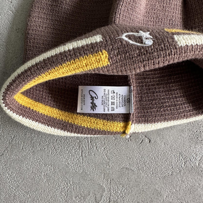 Corteiz Strickmütze mit Streifen - Braun