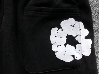 Pantaloncini con strappi in denim