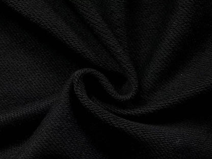 Il denim strappa la ghirlanda di cotone