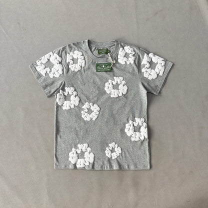 Maglietta con lacrime di denim 