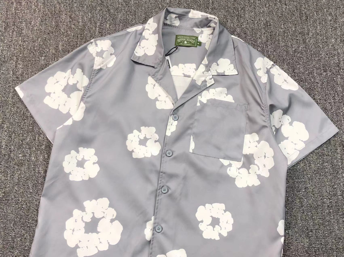 Tuta da bagno con strappi in denim