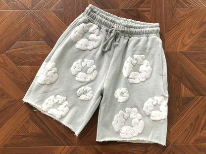 Pantaloncini con strappi in denim 