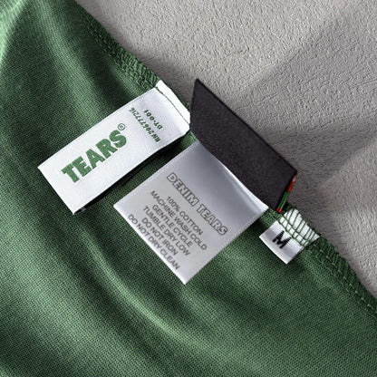 Maglietta con lacrime di denim 