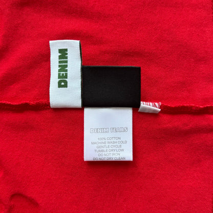 Maglietta con lacrime di denim 