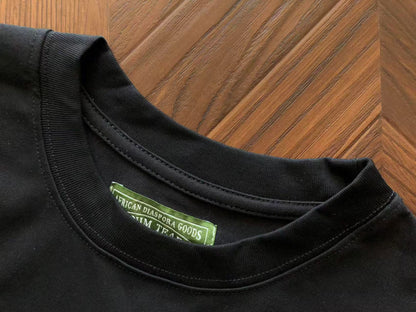 Maglietta con lacrime di denim 