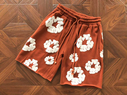 Pantaloncini con strappi in denim 