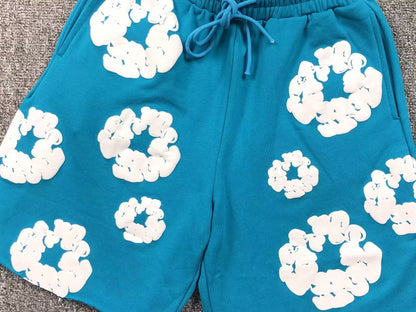 Completo corto con strappi in denim