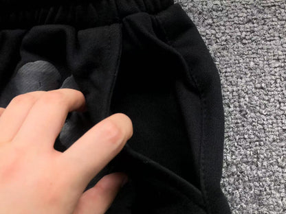 Completo corto con strappi in denim