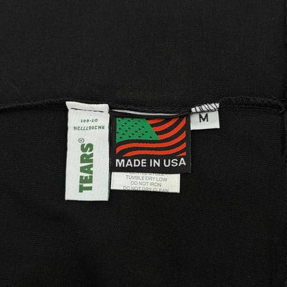 Maglietta con lacrime di denim 