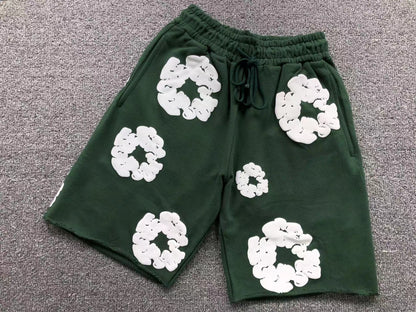 Pantaloncini con strappi in denim