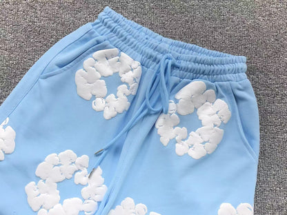 Completo corto con strappi in denim